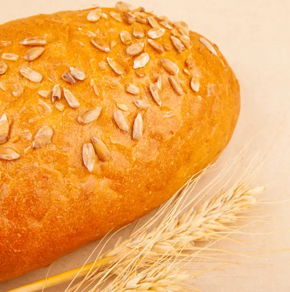 Loaf of bread with seeds — Stock Photo, Image