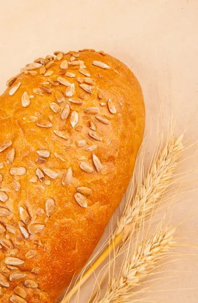 Loaf of bread with seeds — Stock Photo, Image