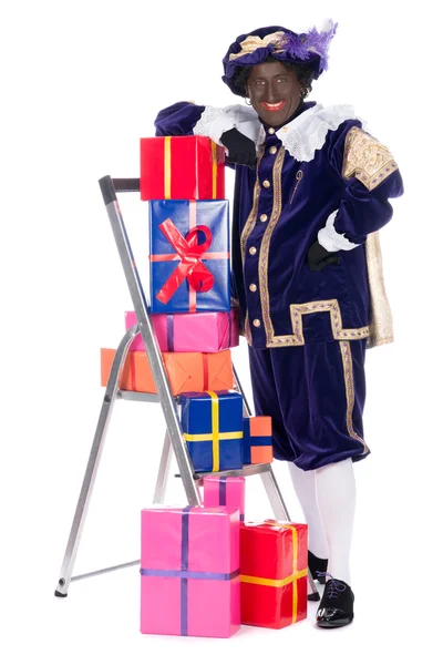 Zwarte piet met presenteert — Stockfoto