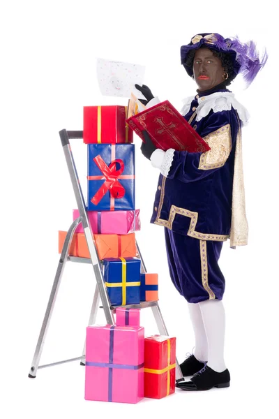 Zwarte piet med presenter — Stockfoto