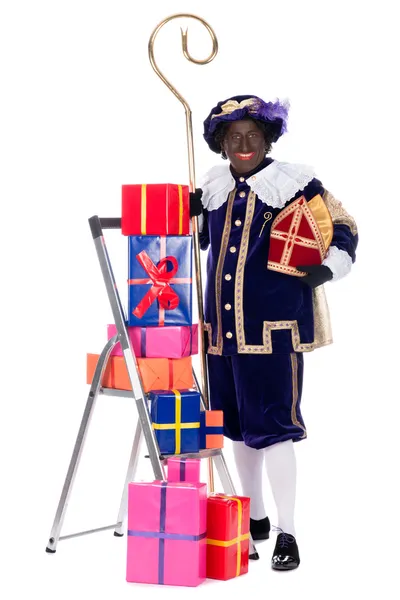 Zwarte Piet mit Geschenken — Stockfoto