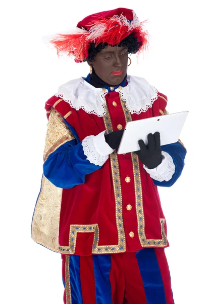 Zwarte piet mit einem Tablet — Stockfoto