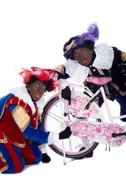 Zwarte piet bir kurabiyeden onun lastik içinde bulur.