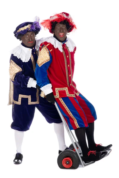 Zwarte piet und sein Mitarbeiter — Stockfoto