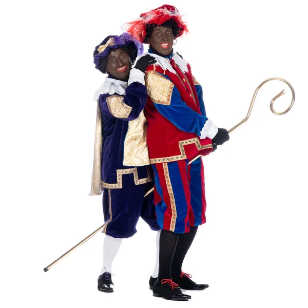 Zwarte Piet and the staff of Sinterklaas — Stock Photo, Image