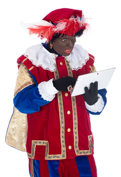 Zwarte Piet with a tablet — Stock Photo, Image