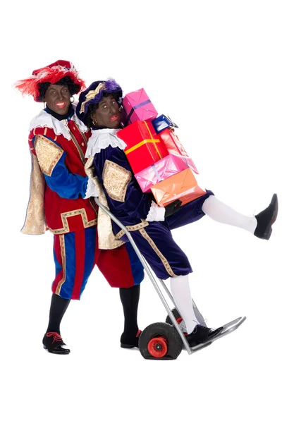 Zwarte Piet med gaver - Stock-foto