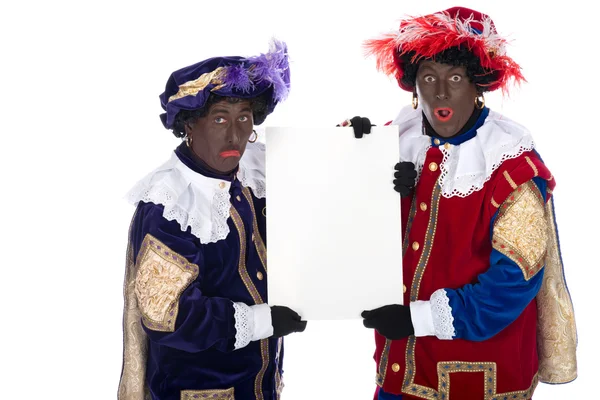 Zwarte piet mit einem Whiteboard, um Ihren eigenen Text auf — Stockfoto