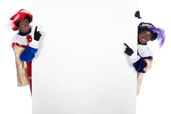 Zwarte piet met een whiteboard, om uw eigen tekst op — Stockfoto