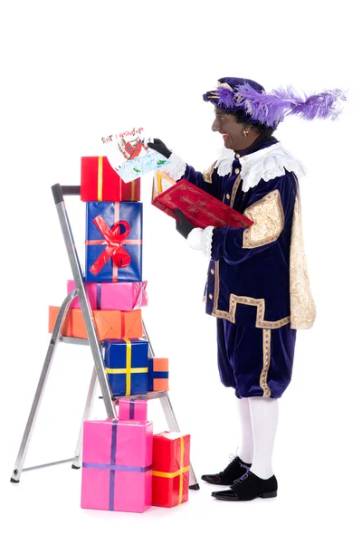 Zwarte piet ajándékokkal — Stock Fotó