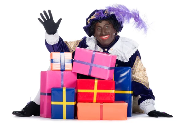 Zwarte Piet with a lot of presents — Stock Photo, Image