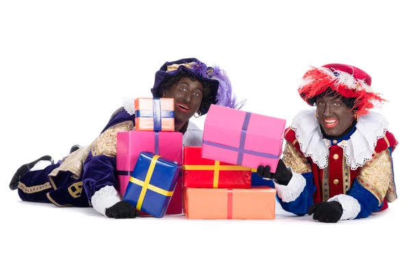 Zwarte Piet com um monte de presentes — Fotografia de Stock