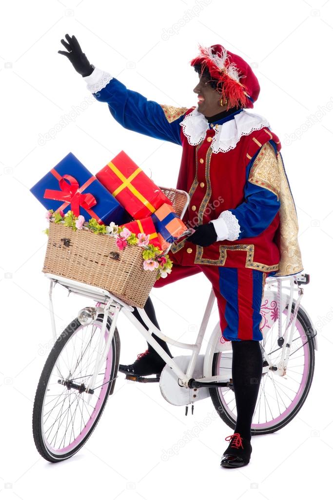 Zwarte Piet on a bike with presents