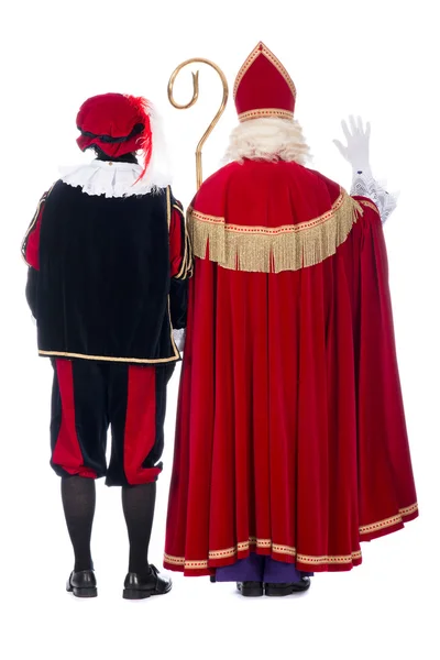 Sinterklaas and Black Pete from the back — Stock Photo, Image