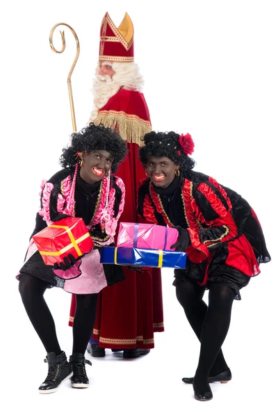 Sinterklaas and a couple of his helpers — Stock Photo, Image