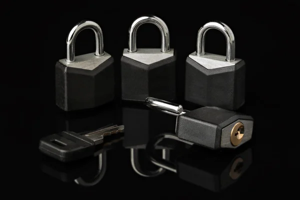Pad Locks and a Key — Stock Photo, Image