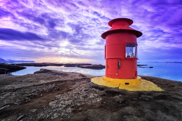 Small red lighthouse Stock Picture