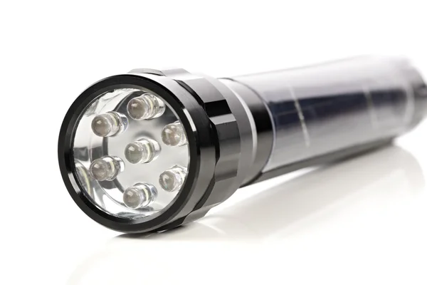 Closeup of a black LED flashlight — Stock Photo, Image