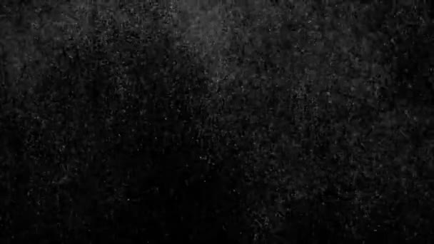 Flux de petites particules blanches 