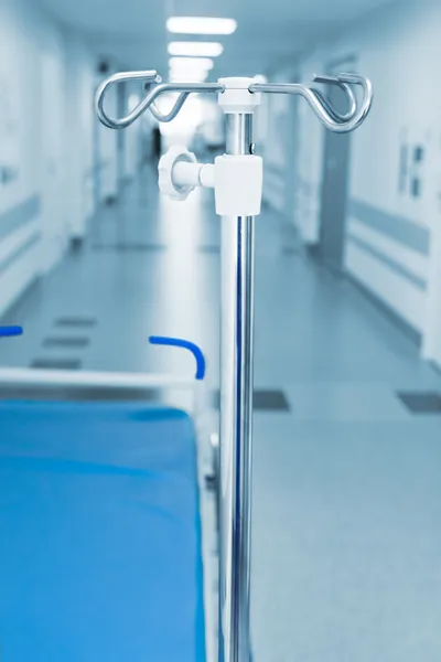 Long corridor in hospital with trolly and rack — Stock Photo, Image