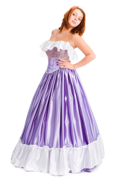 Young attractive woman in long lilac-coloured ball dress — Stock Photo, Image