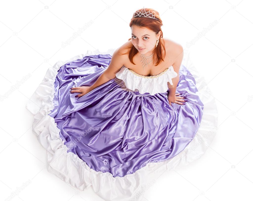 Young attractive woman in evening gown