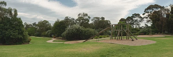 Lekplats i parken panorama — Stockfoto