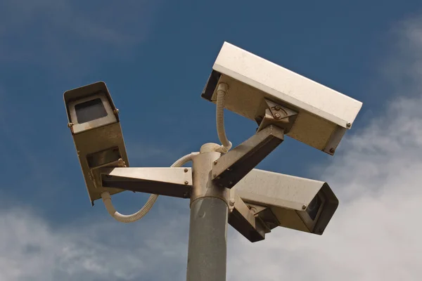 Three cameras on post — Stock Photo, Image