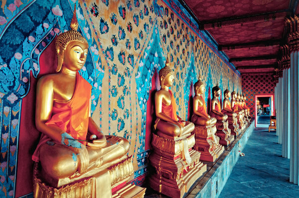 Gloden statues of Buddha in Wat Arun temple, Bangkok