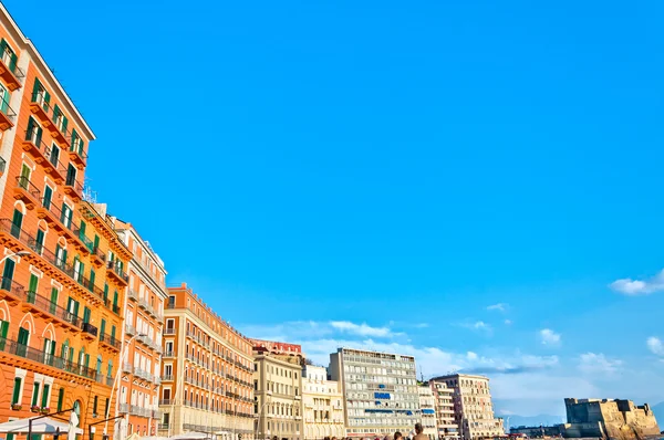 Street view of boardwalk buildings and Castel dell'Ovo in Naples, Italy — Stock Photo, Image