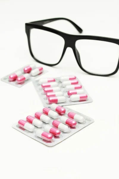 Capsules and pills in package. — Stock Photo, Image