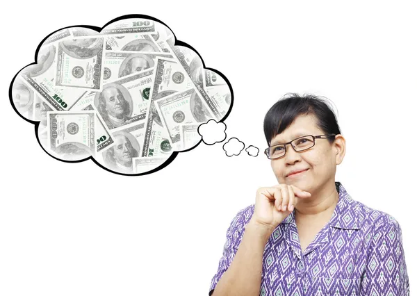Aziatische senior vrouw glimlachend en denken aan geld — Stockfoto