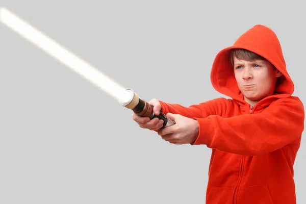 Boy with lightsaber — Stock Photo, Image