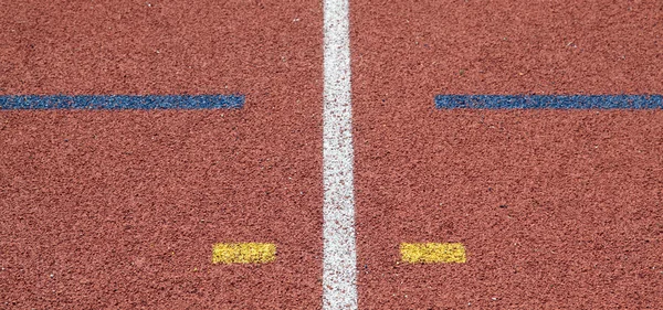 Línea de color en pista de carreras — Foto de Stock