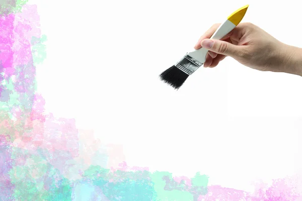 Pincel con mano sobre fondo abstracto acuarela pintado a mano — Foto de Stock