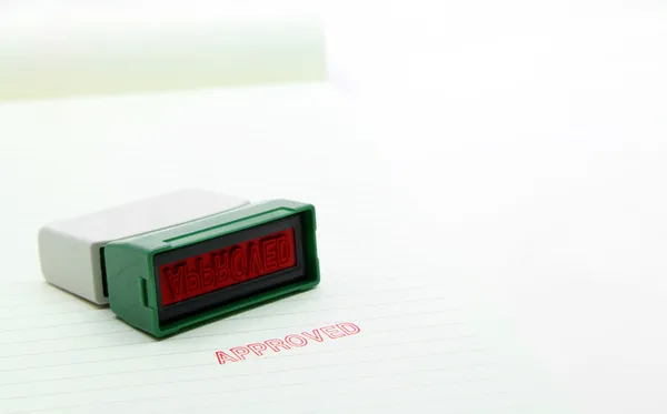 Approved stamp on paper with rubber stamp — Stock Photo, Image