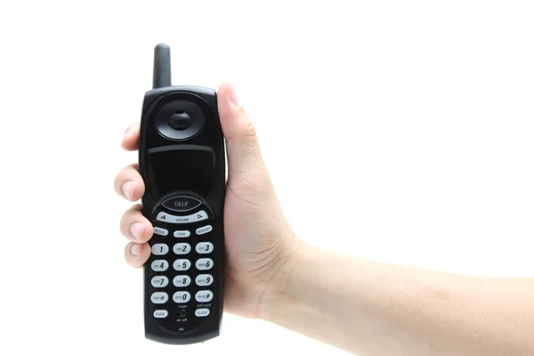 Telefoon in de hand geïsoleerd op wit — Stockfoto