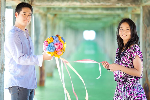 Couples with beautiful bouquet — Stock Photo, Image