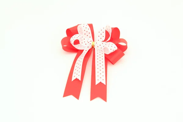 Isolated red and white bow for holiday gift box over white — Stock Photo, Image