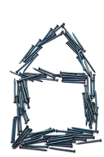 Haus aus Nägeln — Stockfoto