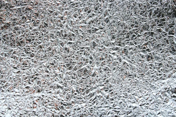 Padrão de papel de folha de alumínio de alimentos enrugados usando como fundo — Fotografia de Stock