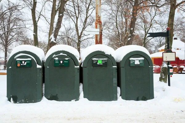 Rubbish bin in winter landscape — Stock Photo, Image