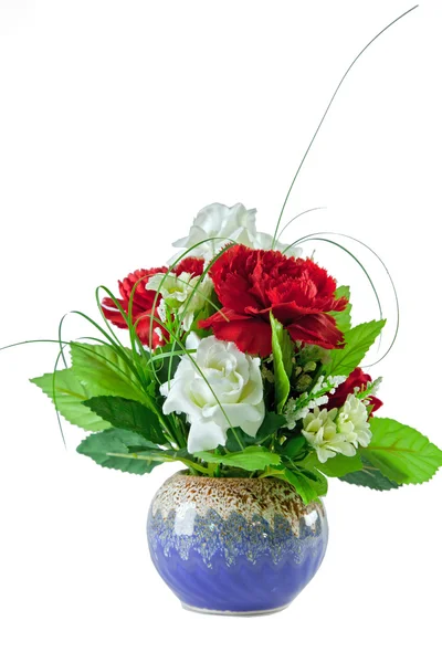 Beautiful red and white roses bouquet in blue vase on white back — Stock Photo, Image