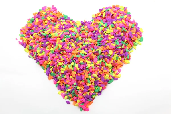Minik taştan yapılmış renkli kalp — Stok fotoğraf