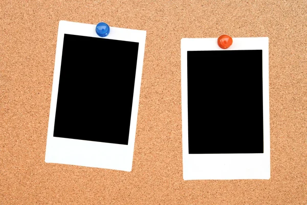 Two blank instant photo frame on notice cork board — Stock Photo, Image