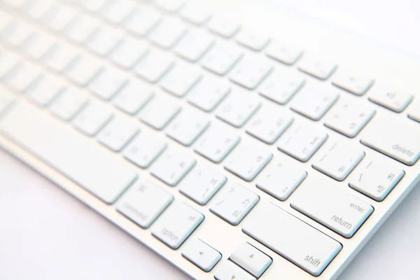 Perspective of return button on white modern keyboard — Stock Photo, Image