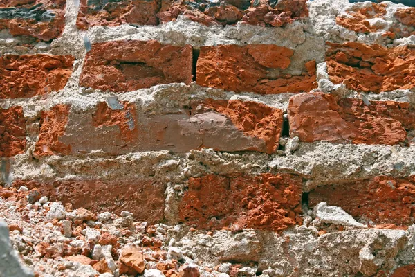 Kırmızı tuğla duvar bilmece çözme — Stok fotoğraf