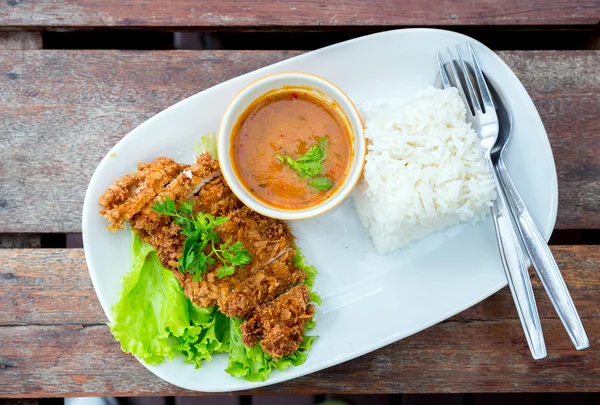 stock image deep fried pork with rice