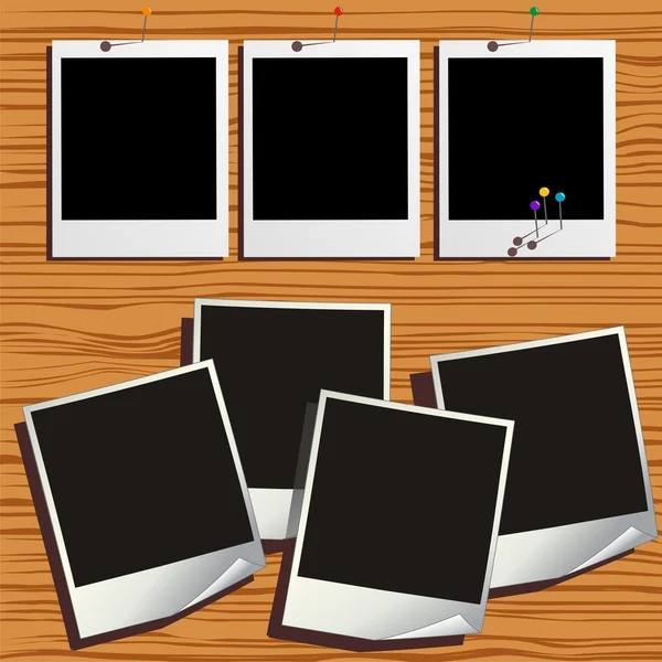 Marcos de fotos con alfileres de colores sobre fondo de madera. Ilustración vectorial — Vector de stock