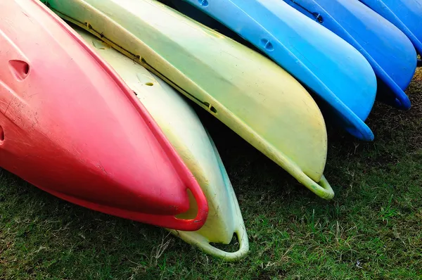 Colorful kayaks in stack — Stock Photo, Image